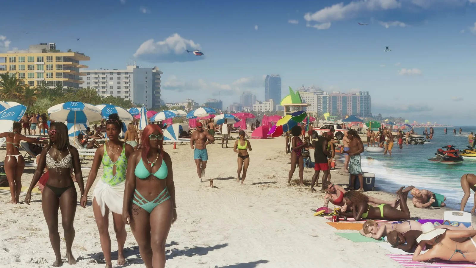 A white lifeguard pickup is parked on the sand near a lifeguard tower while crowds walk, swim and sunbathe.