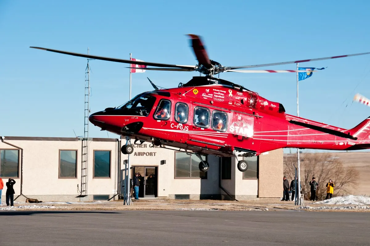 Real world photo for comparison: STARS AW139 helicopter landing in Pincher Creek.