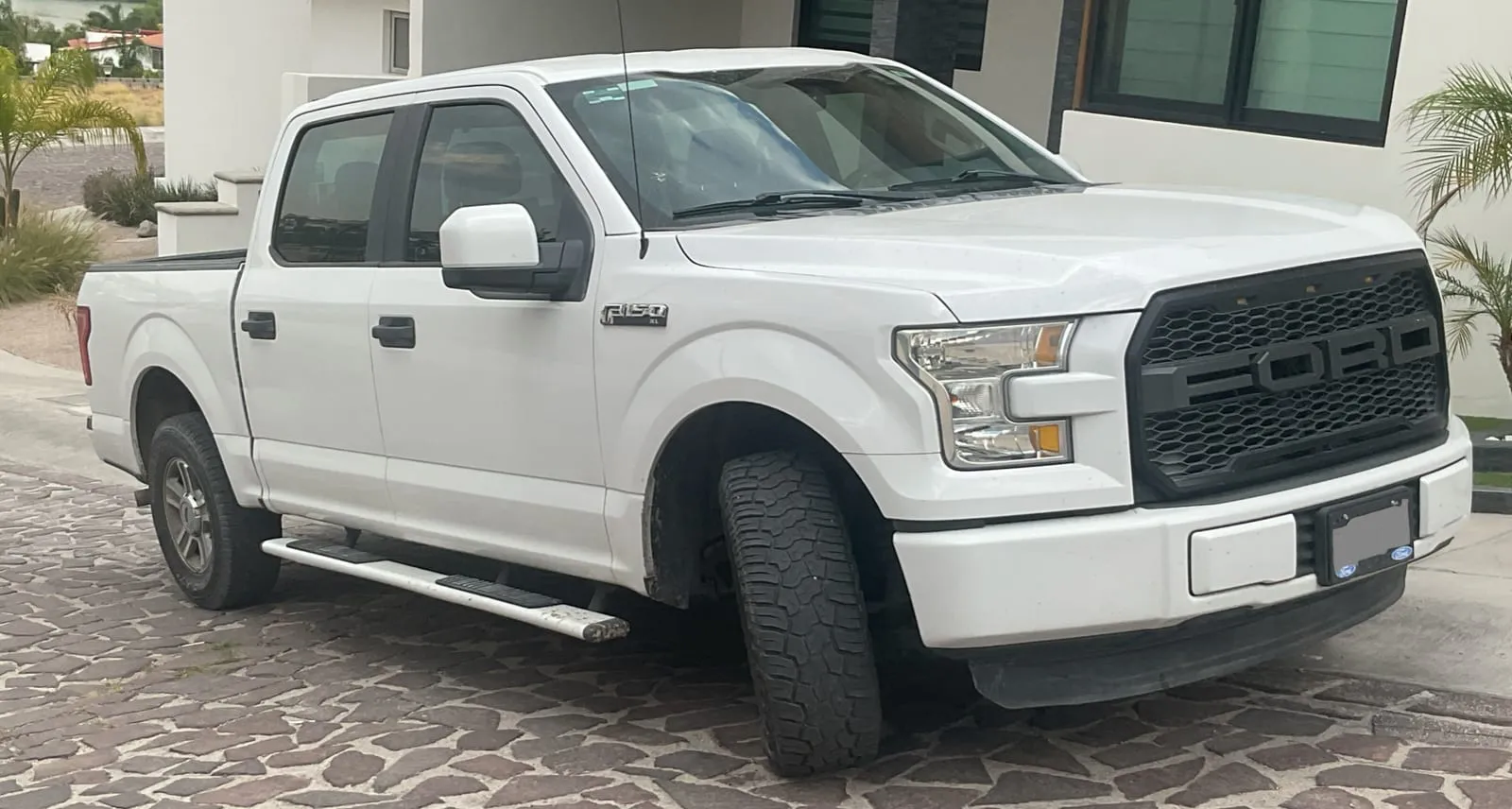 Real world photo for comparison: 2015 Ford F-150 XL.