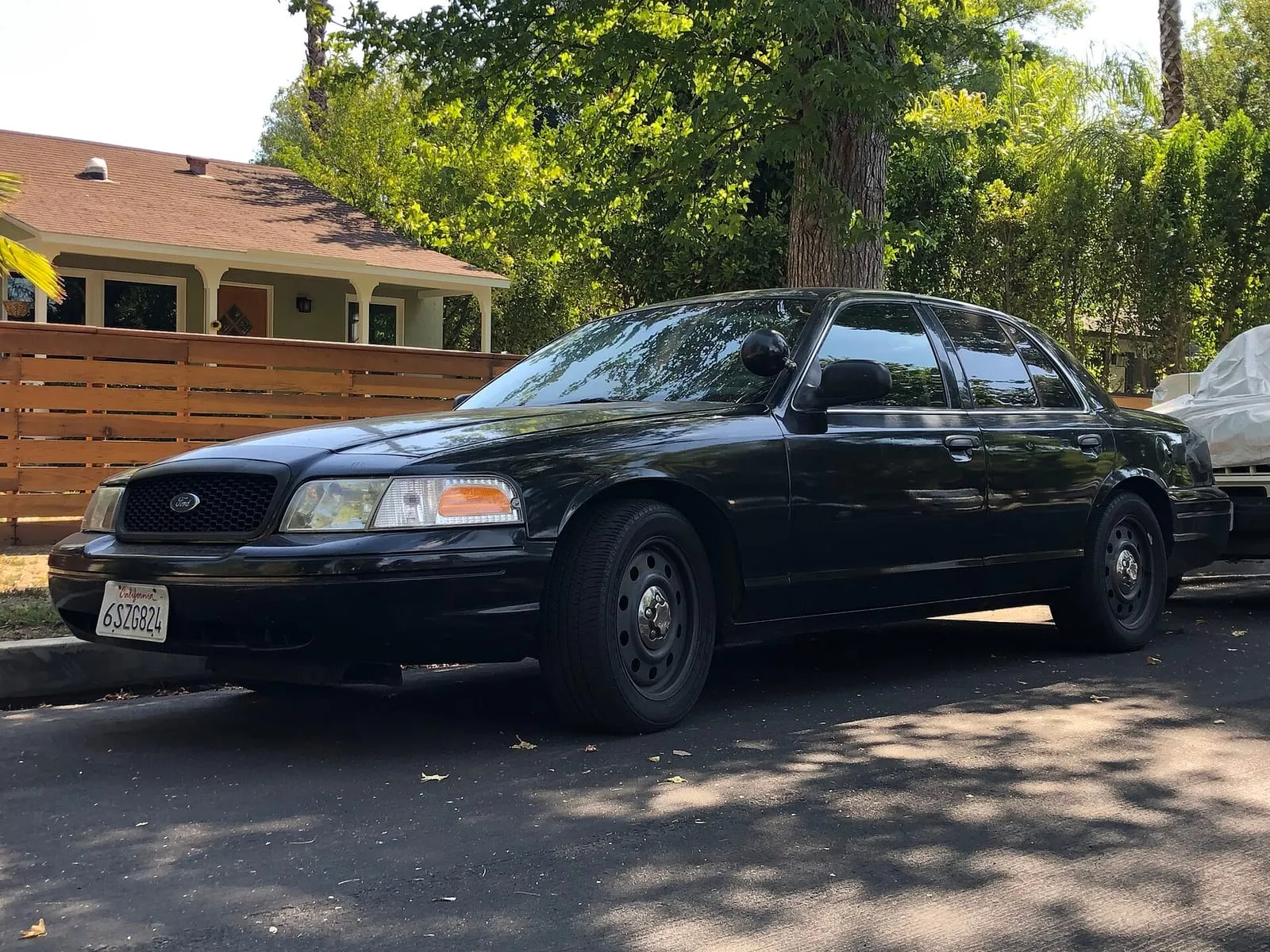 Real world photo for comparison: 2006-2011 Ford Crown Victoria Police Interceptor, front-left.