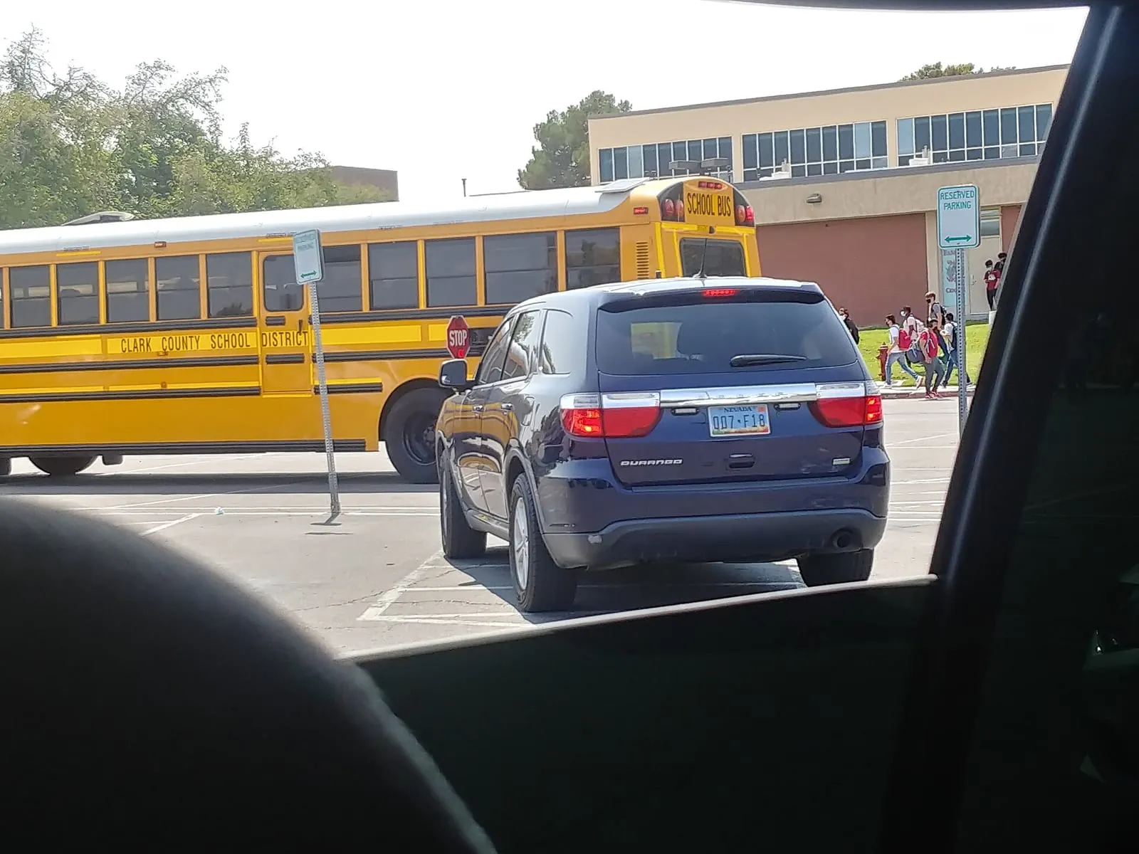 Real world photo for comparison: CCSDPD Unmarked Dodge Durango at Valley High School.